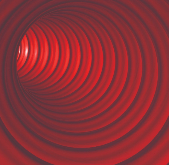 Czerwony tunel z spiralnymi żebrami, widok od środka w głąb konstrukcji.